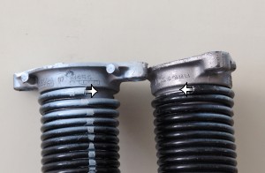 Repair workers take note: Double-check garage door torsion springs' winds to correctly replace springs.