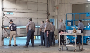 Dan Musick trained maintenance men at Yale Materials Handling in Green Bay, WI in the spring of 2009. Here Dan services the bottom section while explaining what extra steps would need to be taken to replace the bottom section.