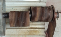 Broken torsion springs on mini-warehouse or one-piece curtain roll-up doors