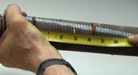 Make sure that you compress the coils of the Clopay EZ-Set spring.