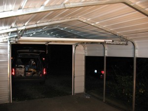 An image of a double low headroom garage door assembly mounted with four inches of headroom.