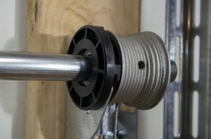 An EZ-SET black plastic bearing holder that has been reversed to show the proper installation.