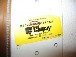 A yellow Clopay sticker showing the model number 4050.