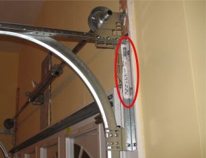 An image of a Clopay label pasted vertically on a flag bracket. 