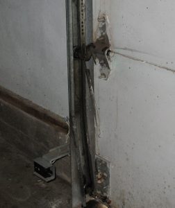 An image of installed bottom hinge straps.