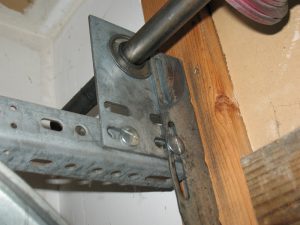 A cable drum scraping the top of the flag bracket.