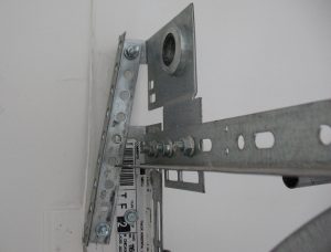 Extra support is provided to the anchor bracket because it did not reach the jamb.