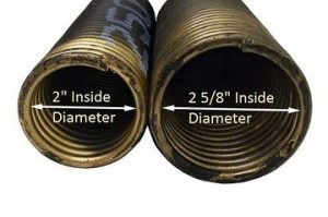 An image displaying the inside diameter of a 2 inch and 2 5/8 inch torsion springs. 