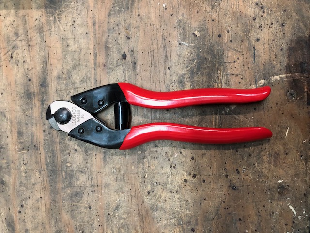 An image of cable cutters used for cutting garage door cables. 