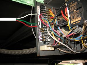 An image of the operator terminal strip with all of the wires connected.