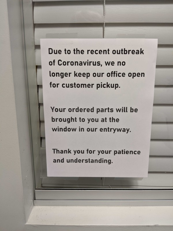 Picture of Coronavirus sign in the window.