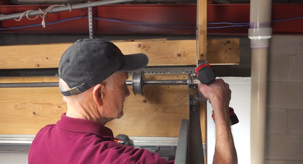 Winding torsion springs using the Safe-T-Winder™
