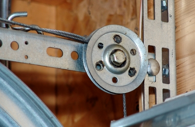 A split extension spring pulley