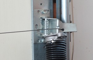 DIYers: Be sure to position torsion springs properly for replacement.