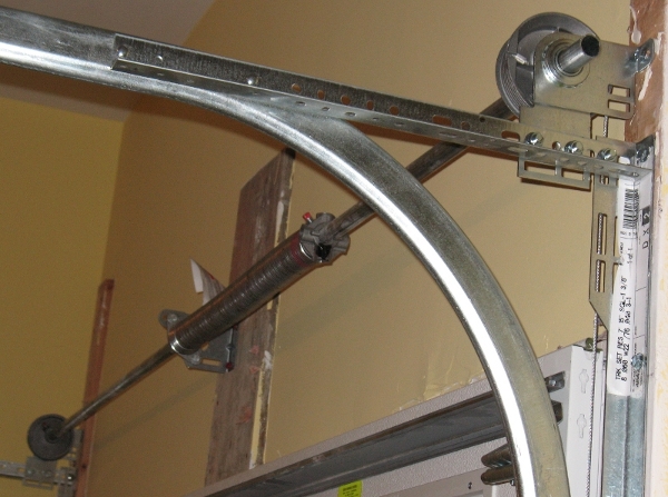 Install A Single Torsion Spring Assembly, Which Way To Wind Spring On Garage Door