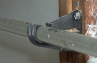 Clopay EZ-Set shaft support bracket.