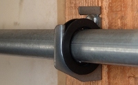 The center support bracket and bushing on TorqueMaster systems.