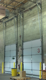 Vertical lift garage doors open straight up.